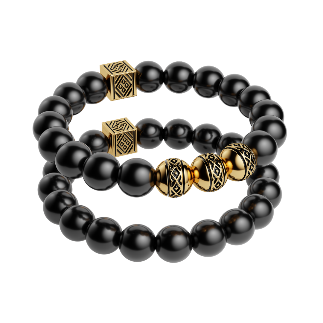 Dorze Tibeb stackable bead bracelets: black round beads with gold-plated patterned cubes