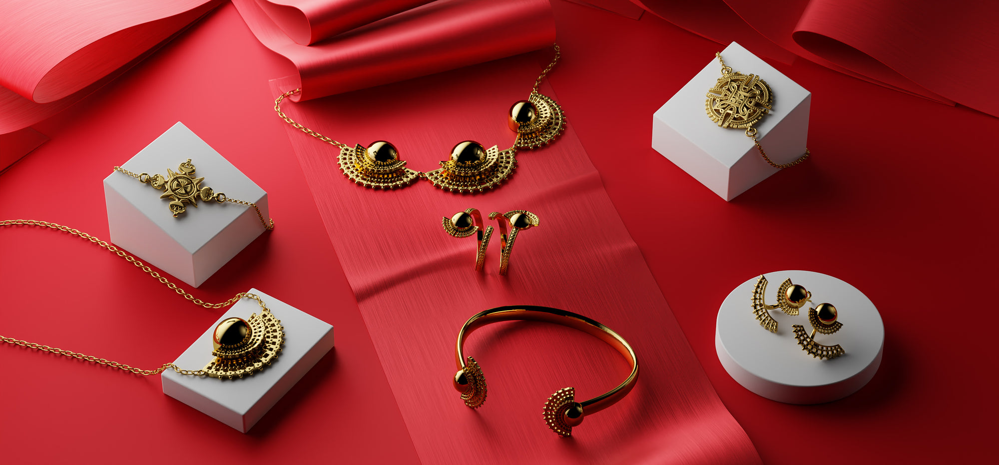 Yenaé 14K gold plated Tsirur and Cross collection displayed on stands. Yenaé's Best Seller collection