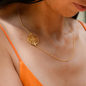 A Model Wearing Yenaé 14K Gold Plated Axum Side Cross Pendant Necklace