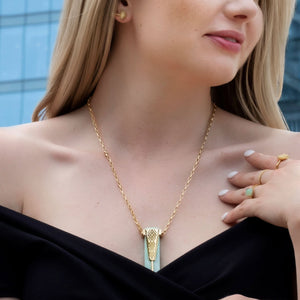 Yenaé Jewelry Collection 14 carat gold plated semi-precious gemstone Woriro chrysoprase necklace worn by a model.