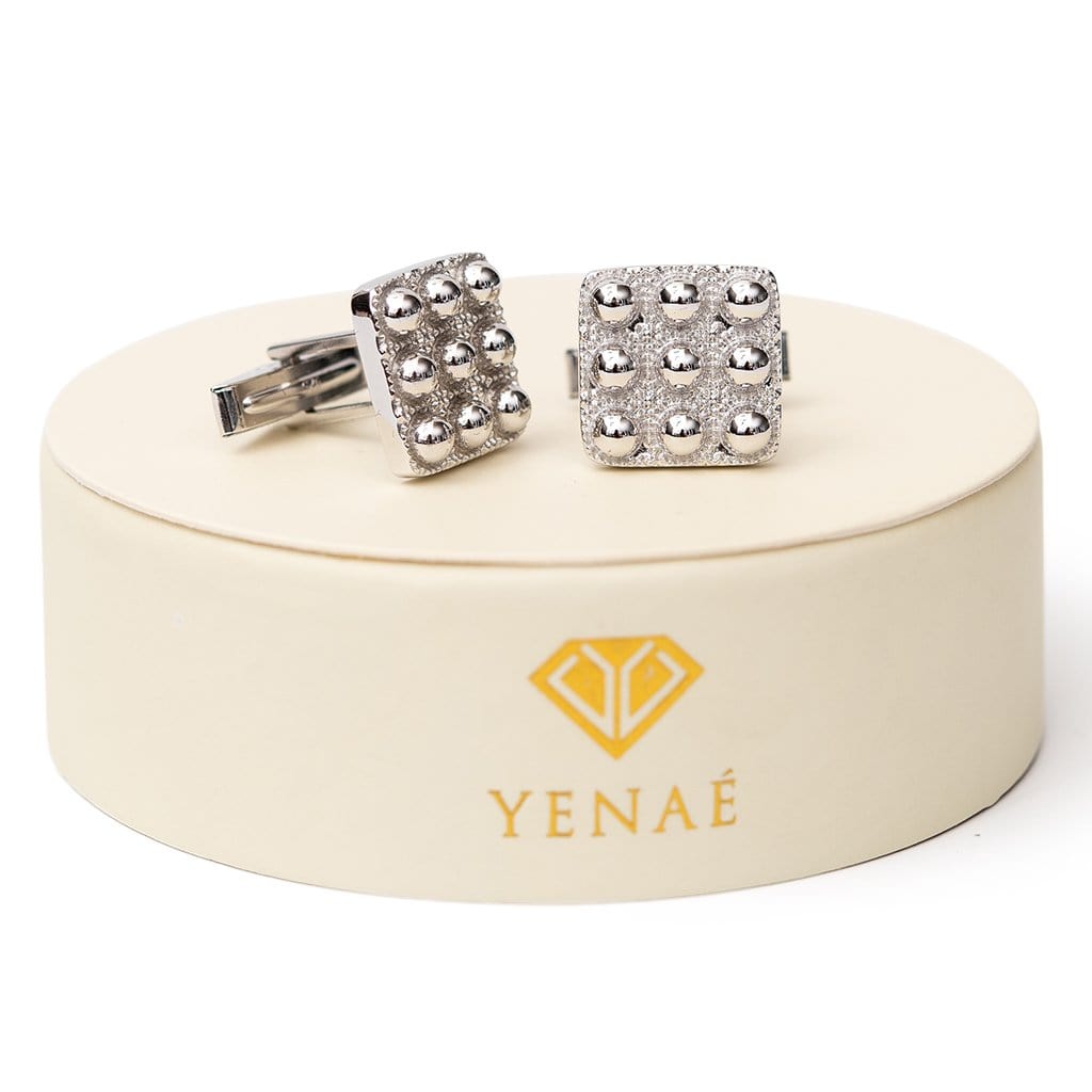 Yenaé RhodiumPlated Telsom Dome cufflink displayed on package.